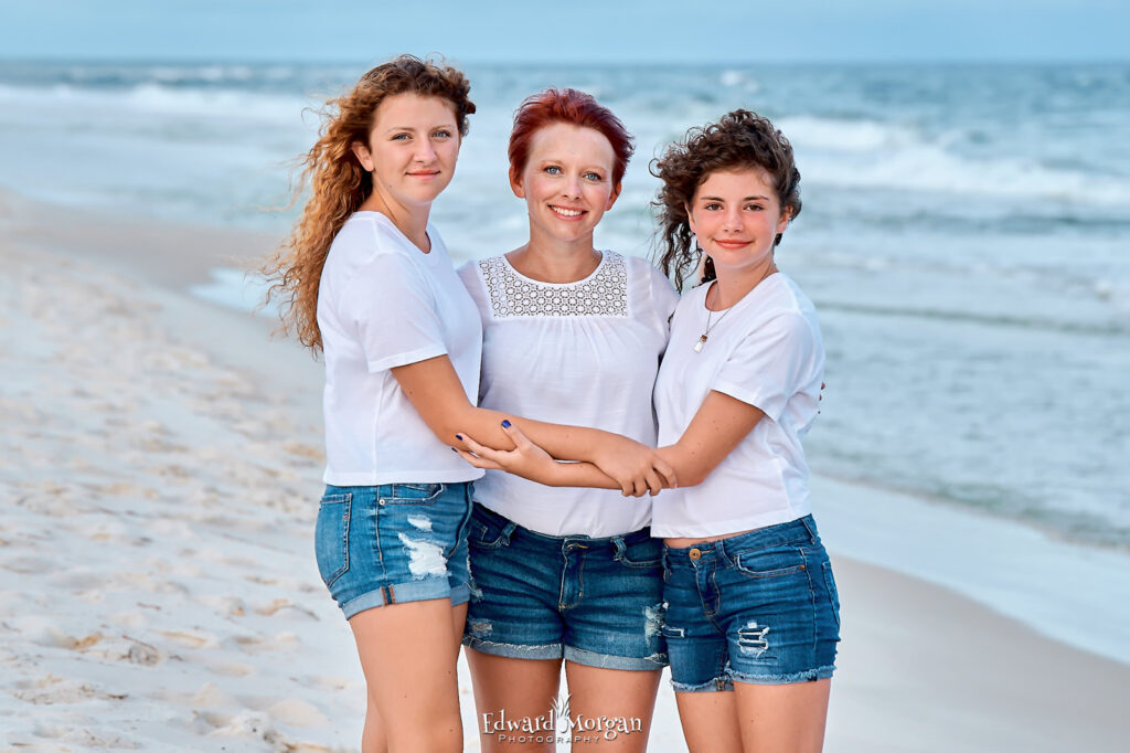 Orange Beach Photographers Group of three people on the beach group of three people on the beach.