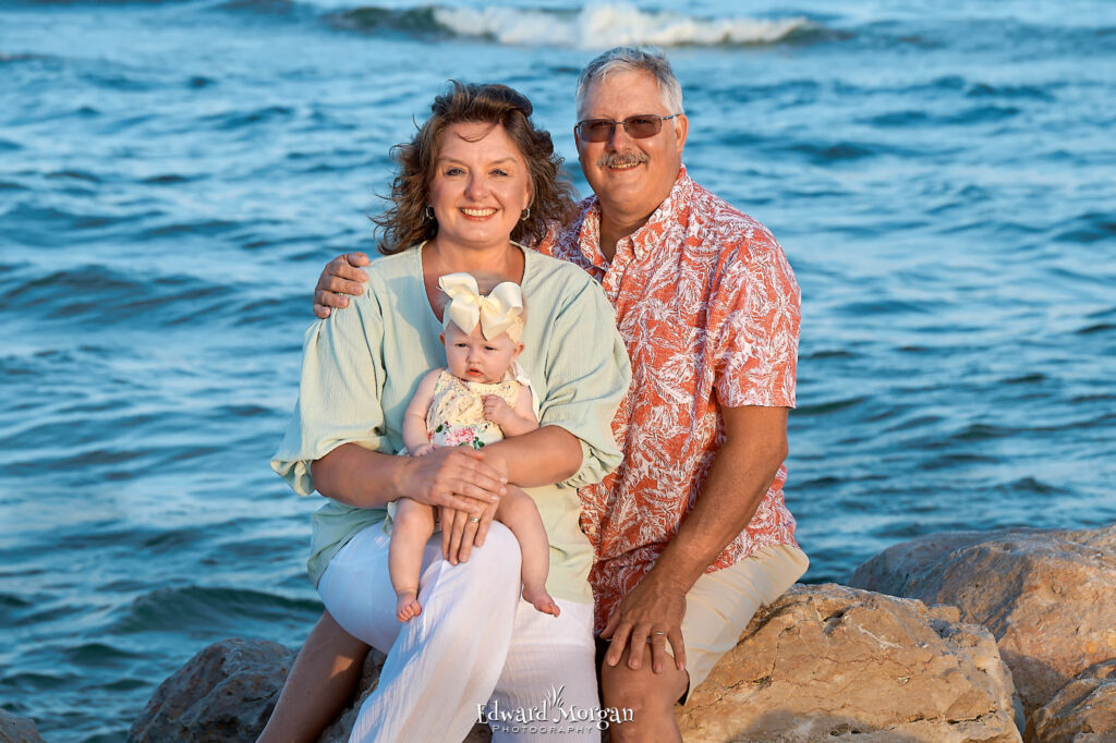 Orange Beach photographers. A family of three on the beach.